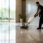 Healthy home flooring—Close-up of a professional cleaning a wooden floor with eco-friendly products in a bright, modern living room